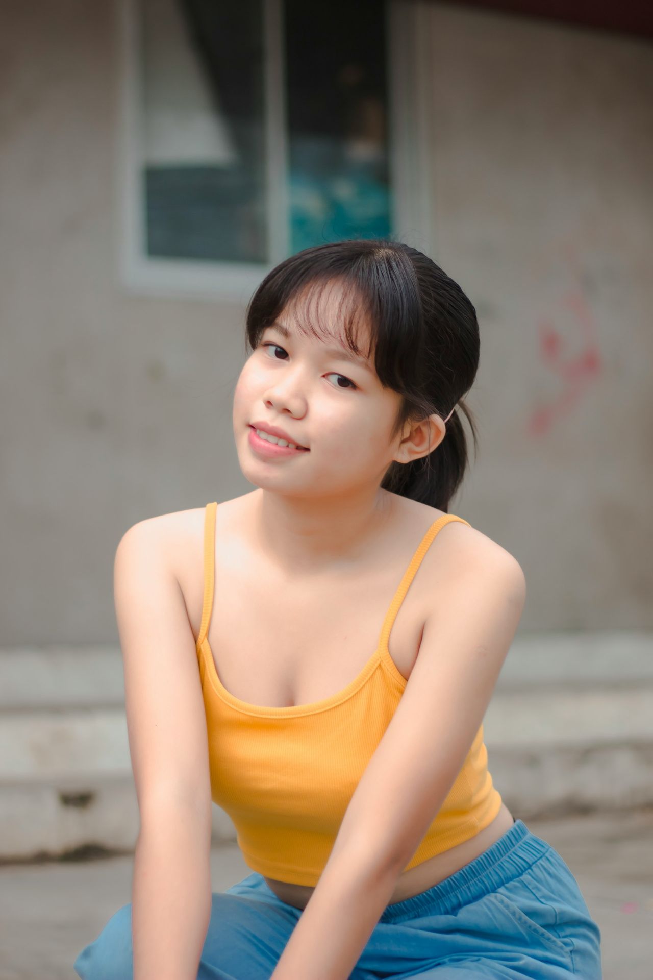 a woman sitting on a step